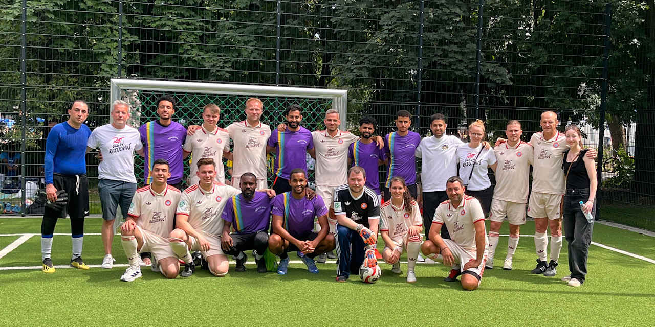 Participants in the 'Space for Everyone' small-sided tournament in the Old Botanical Garden, Munich