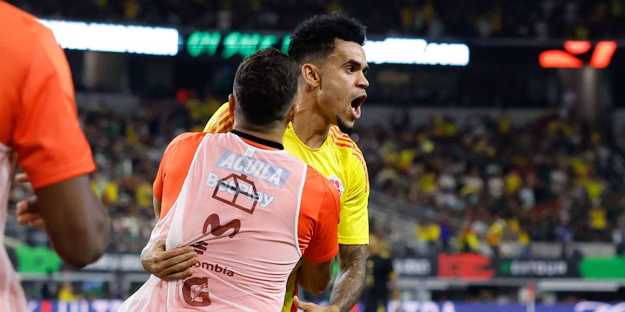Luis Diaz celebrates with a team-mate after his goal to make it 2-0 in Colombia's friendly against Mexico.