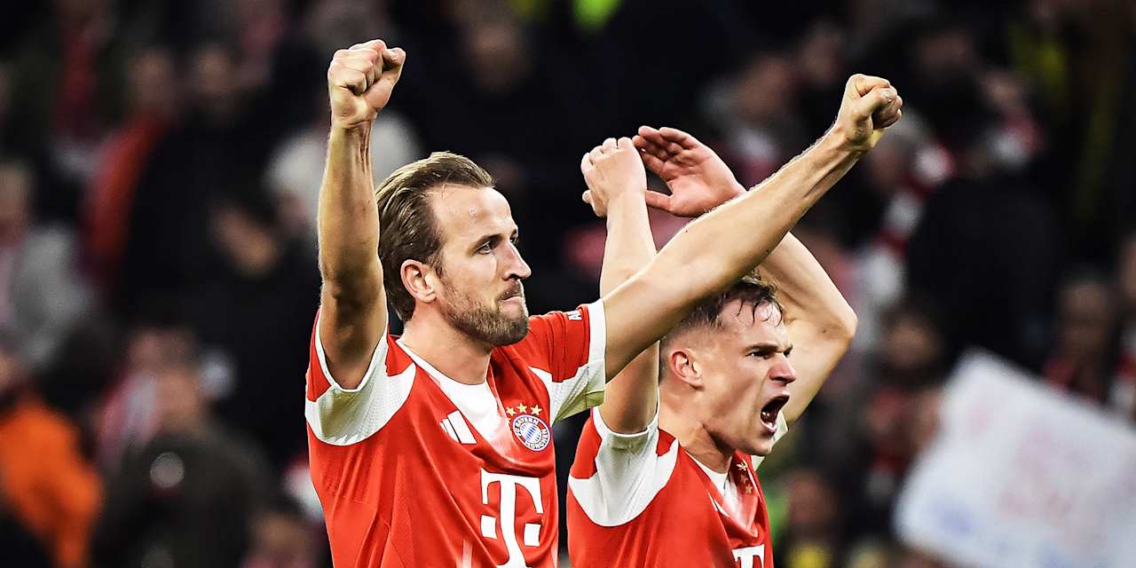 Harry Kane und Joshua Kimmich jubeln im Topspiel des FC Bayern gegen Borussia Dortmund