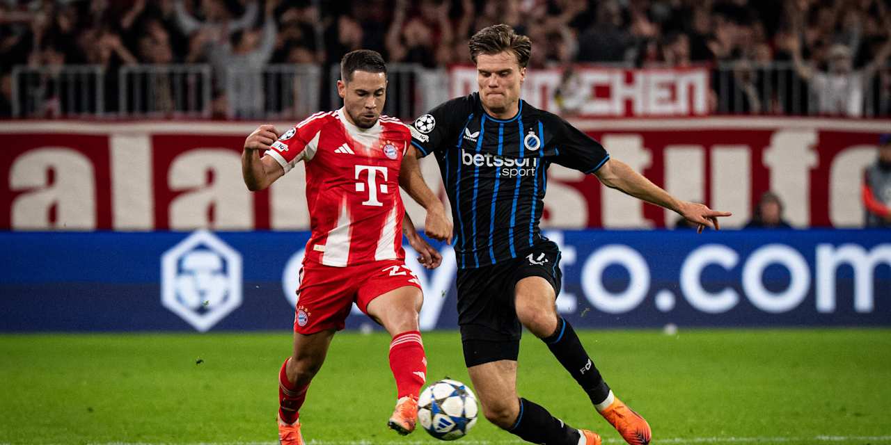 Raphael Guerreiro im Zweikampf gegen Brügge