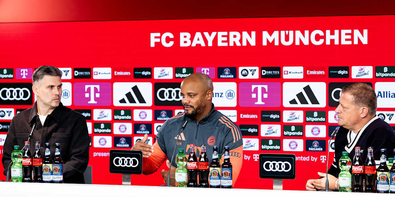 Holger Quest, Vincent Kompany, Max Eberl im Pressetalk des FC Bayern vor Gladbach