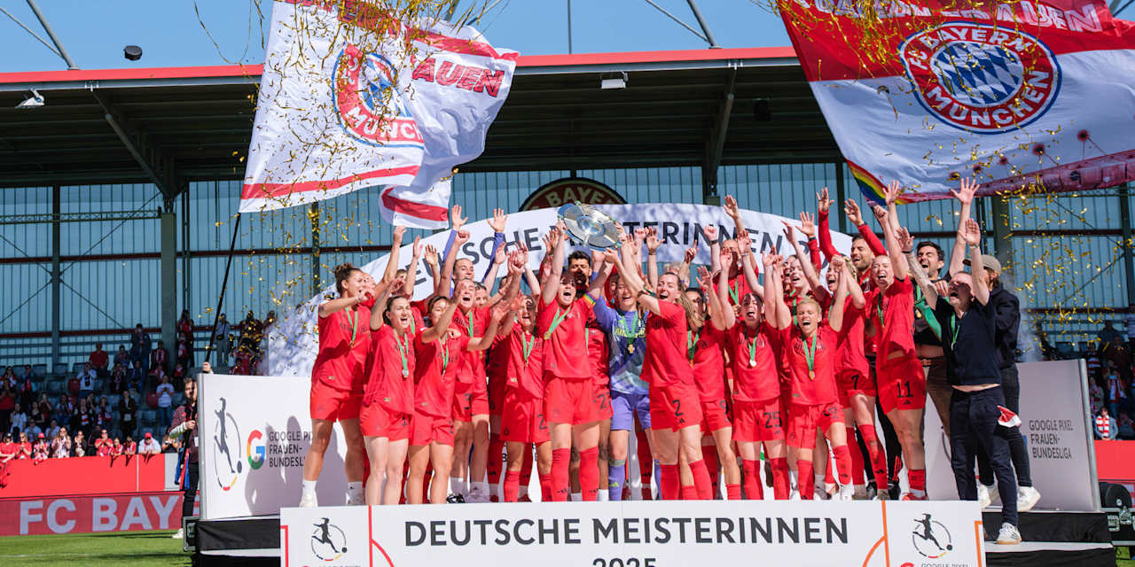 FC Bayern Women being presented with the Meisterschale and hoisting it into the air.