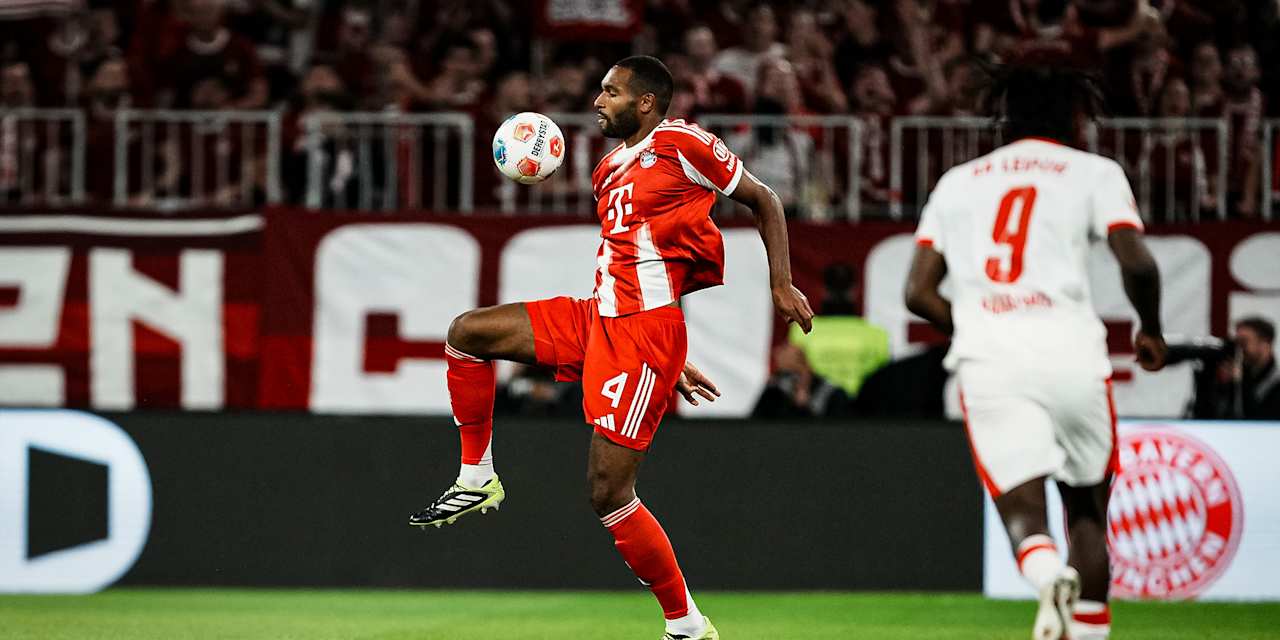 Jonathan Tah with the ball at his feet during the Bundesliga season opener between FC Bayern and RB Leipzig