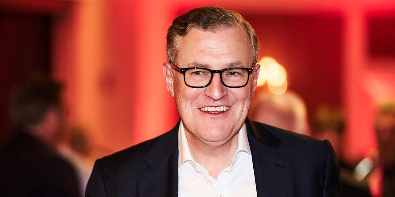 Jan Christian Dreesen lachend auf dem Bankett in Madrid