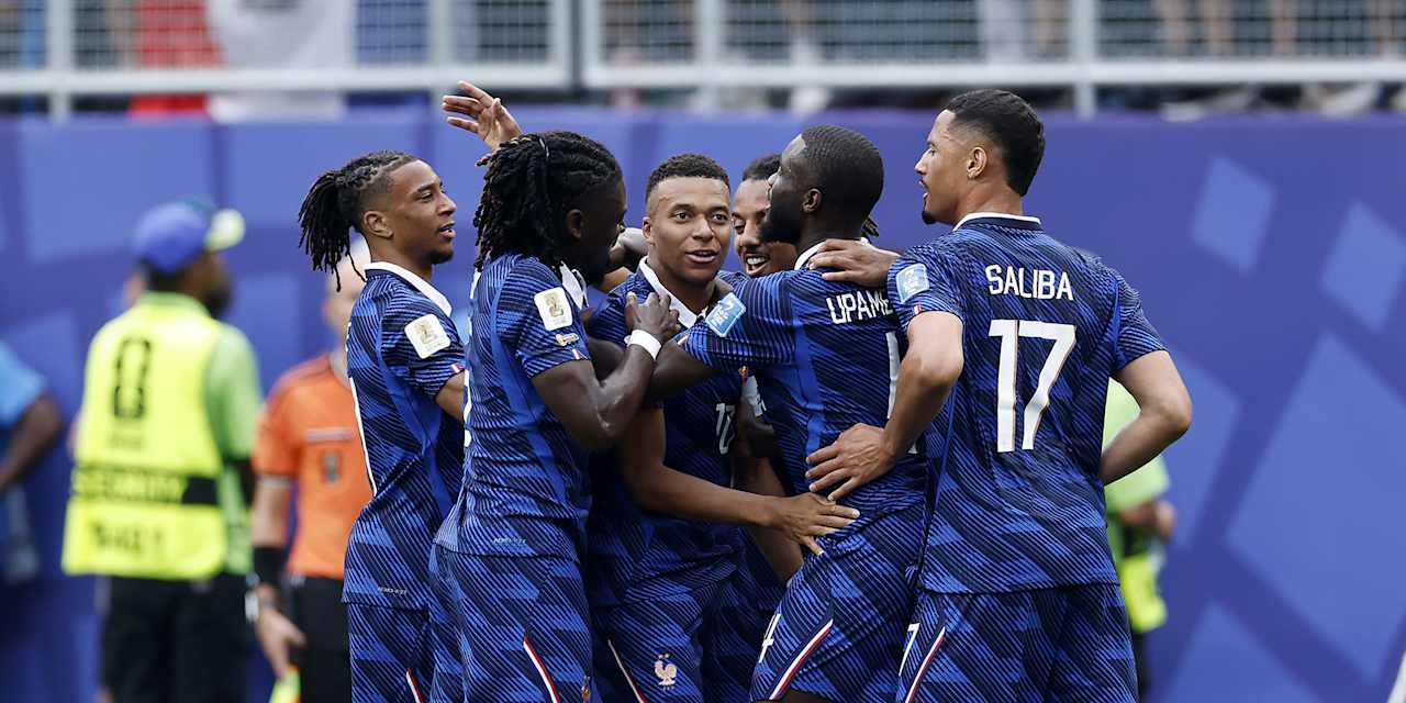 Michael Olise and his French teammates celebrate a goal against Iraq at the 2026 World Cup.