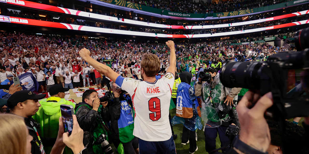 Harry Kane celebrates reaching the quarter-finals with the England fans