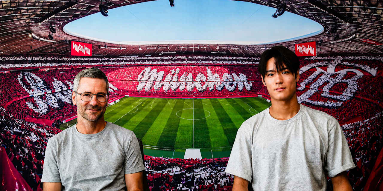Michael Wiesinger (li.) und Jae-won Heo (re.) sitzen nebeneinander.