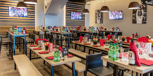 Franz Beckenbauer Lounge – table set, pictures of Franz on the wall