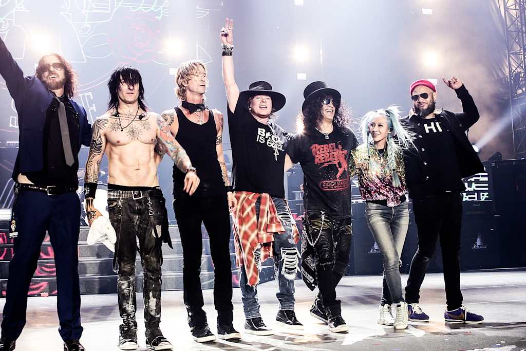 The band Guns N' Roses on stage after a concert
