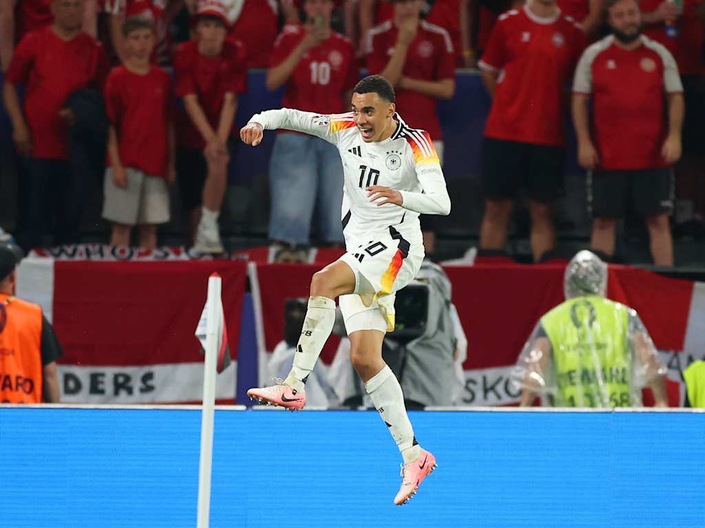 Jamal Musiala celebrates against Denmark
