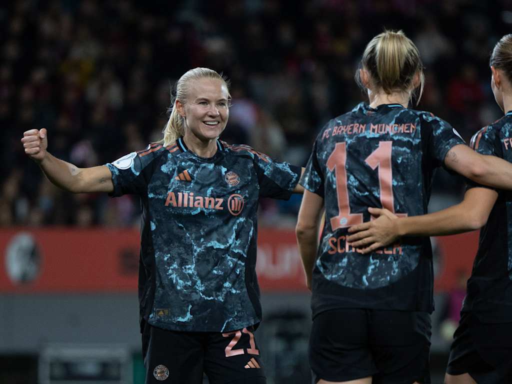 FC Bayern Women celebrate scoring in Freiburg