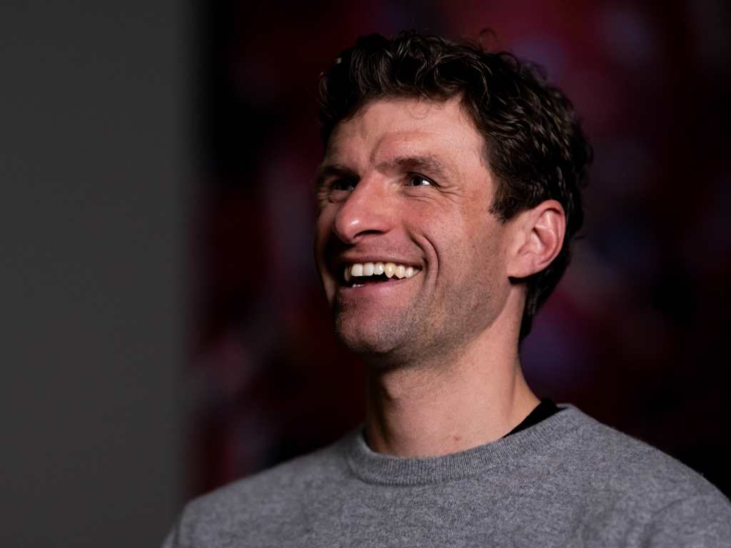 Thomas Müller faces the camera with a smile