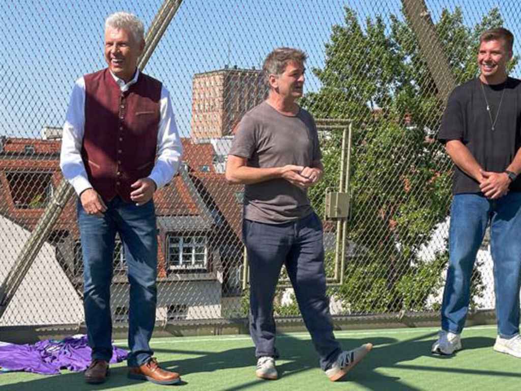 Münchens OB Dieter Reiter, Organisator Tim Hoffmann und Steffen Hamann stehen zusammen