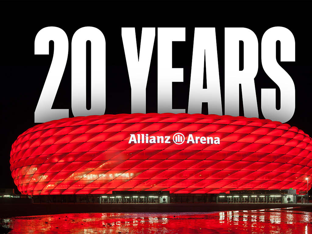 Wording 20 Years above red-lit Allianz Arena