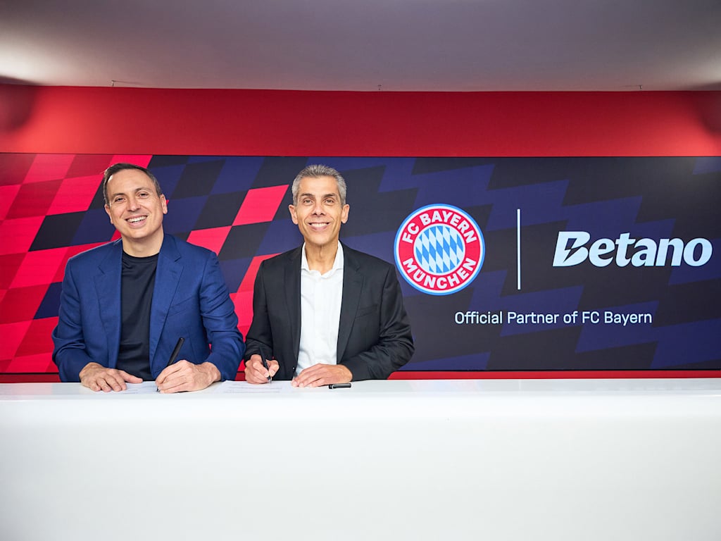 Directors George Daskalakis and Michael Diederich seal the partnership between FC Bayern and Betano