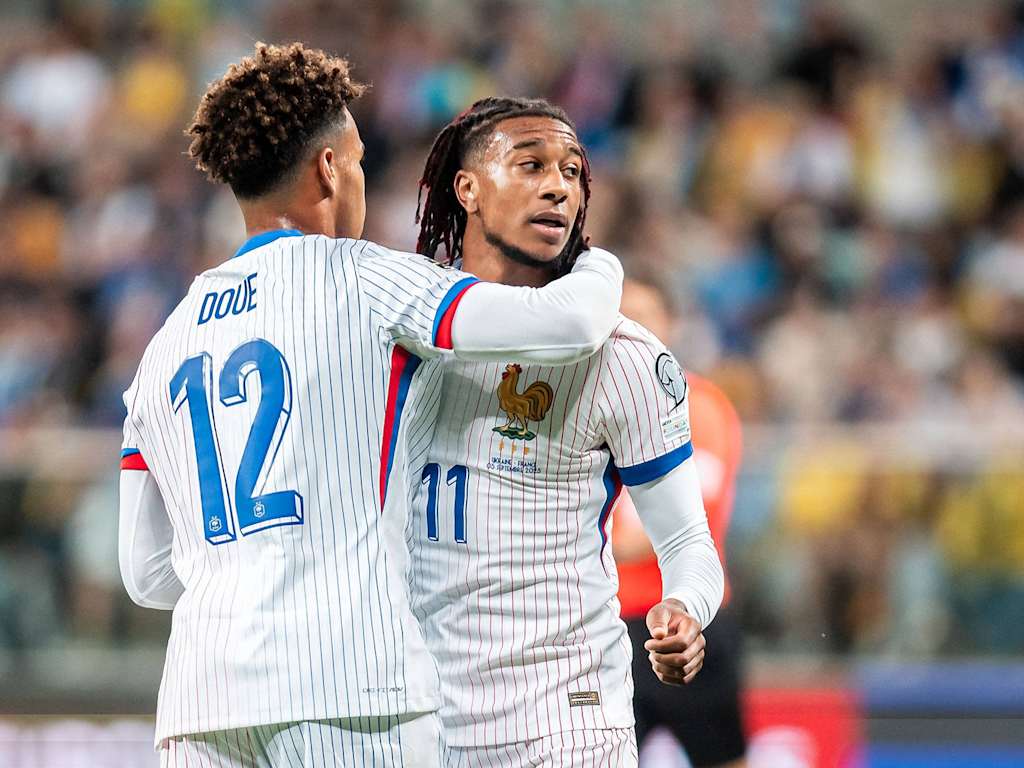 Michael Olise celebrates his goal in the international between France and Ukraine.