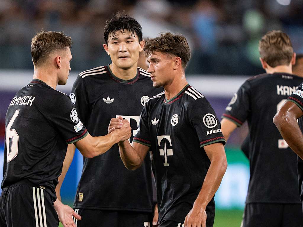 Joshua Kimmich, Minjae Kim and Tom Bischof high-five after FC Bayern's Champions League game at Pafos FC.