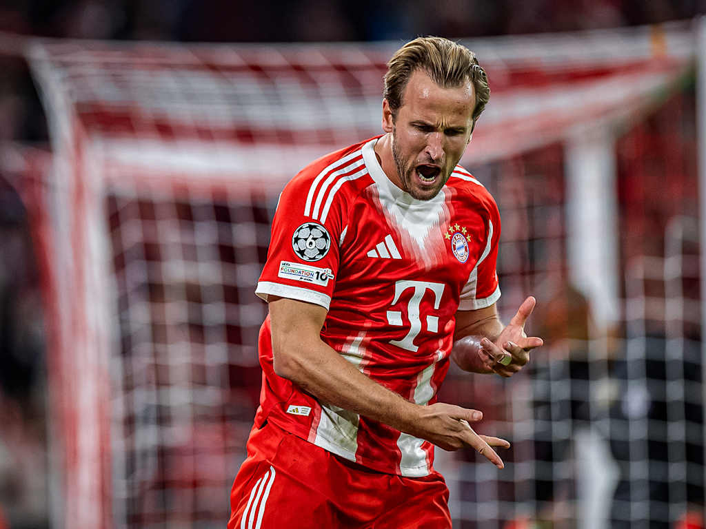 Harry Kane celebrates during FC Bayern's home game against Chelsea in the Champions League opener
