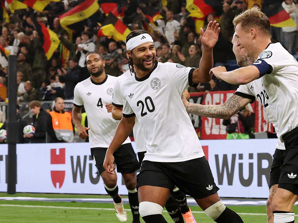 Serge Gnabry and Joshua Kimmich celebrate a goal for Germany