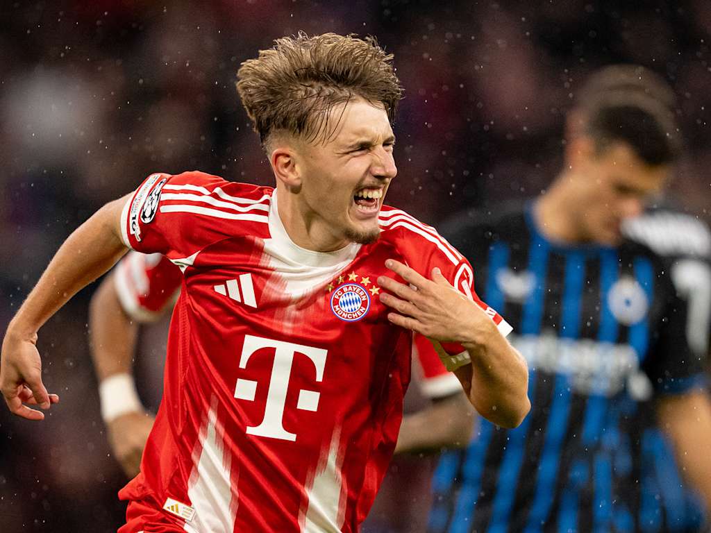 Lennart Karl celebrates after scoring his first Champions League goal in FC Bayern's match against Club Brugge.