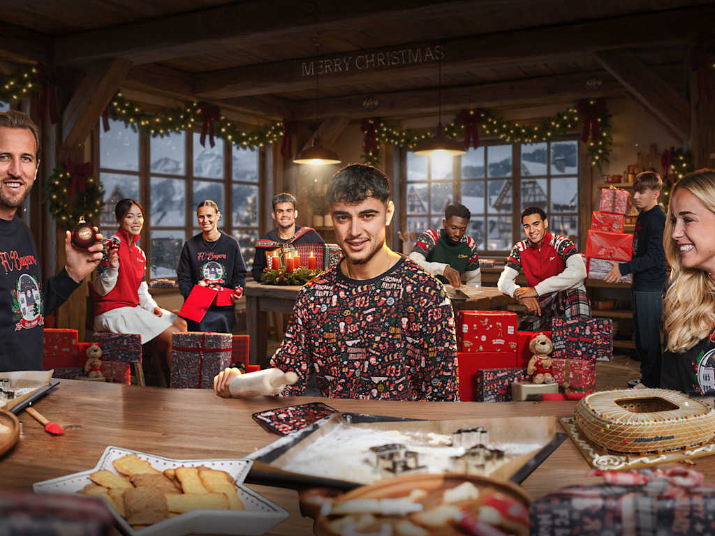 Grafik mit Spielern und Spielerinnen des FC Bayern in einem weihnachtlich geschmückten Raum
