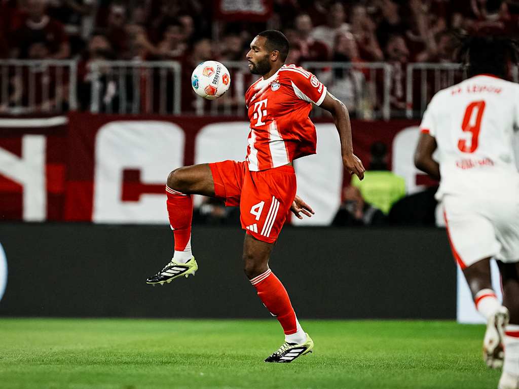 Jonathan Tah with the ball at his feet during the Bundesliga season opener between FC Bayern and RB Leipzig