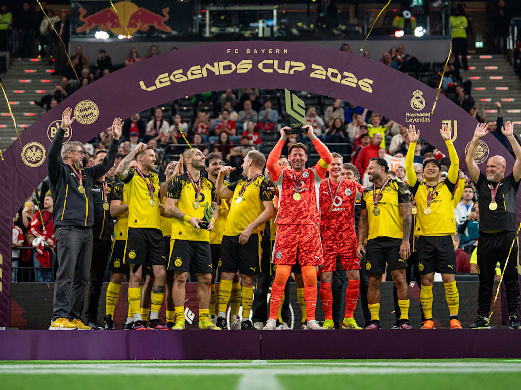 Roman Weidenfeller and Borussia Dortmund lift the trophy at the FC Bayern Legends Cup 2026 at SAP Garden