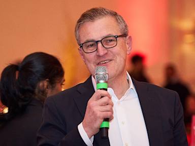 Jan-Christian Dreesen speaks at the FC Bayern banquet after the Champions League match at Arsenal