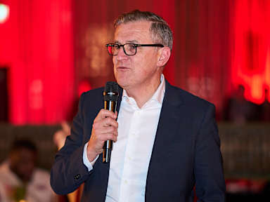 Jan-Christian Dreesen gives a speech following FC Bayern's match against Shakhtar Donetsk