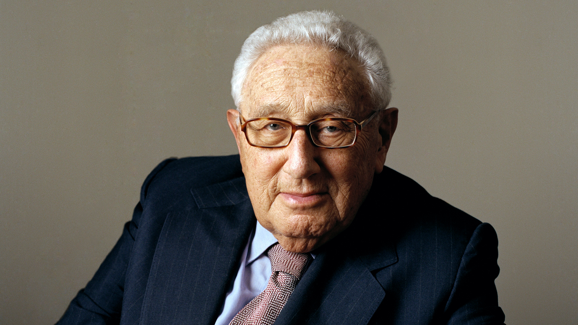 Dr. Henry Kissinger