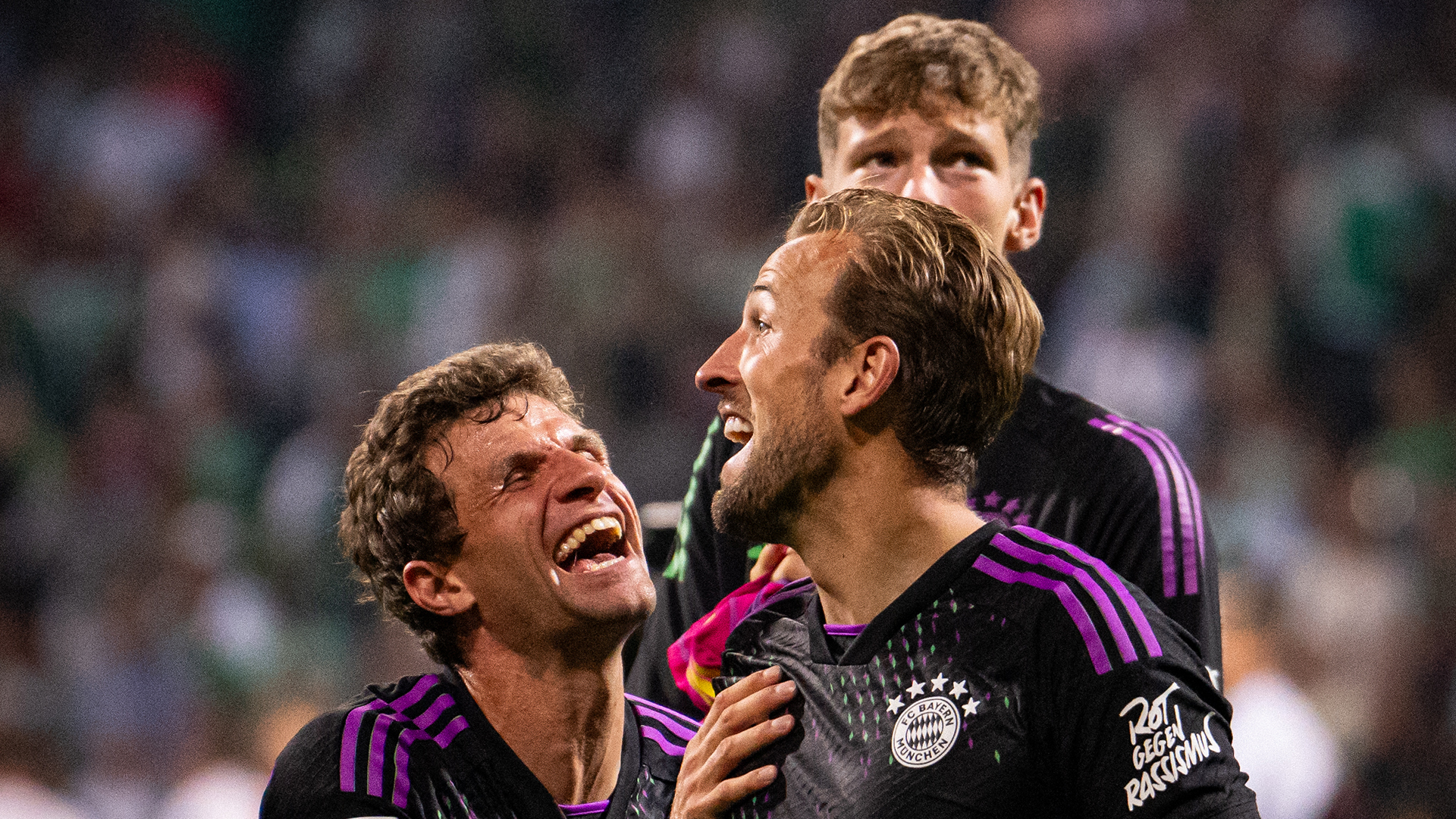 Thomas Müller and Harry Kane laughing