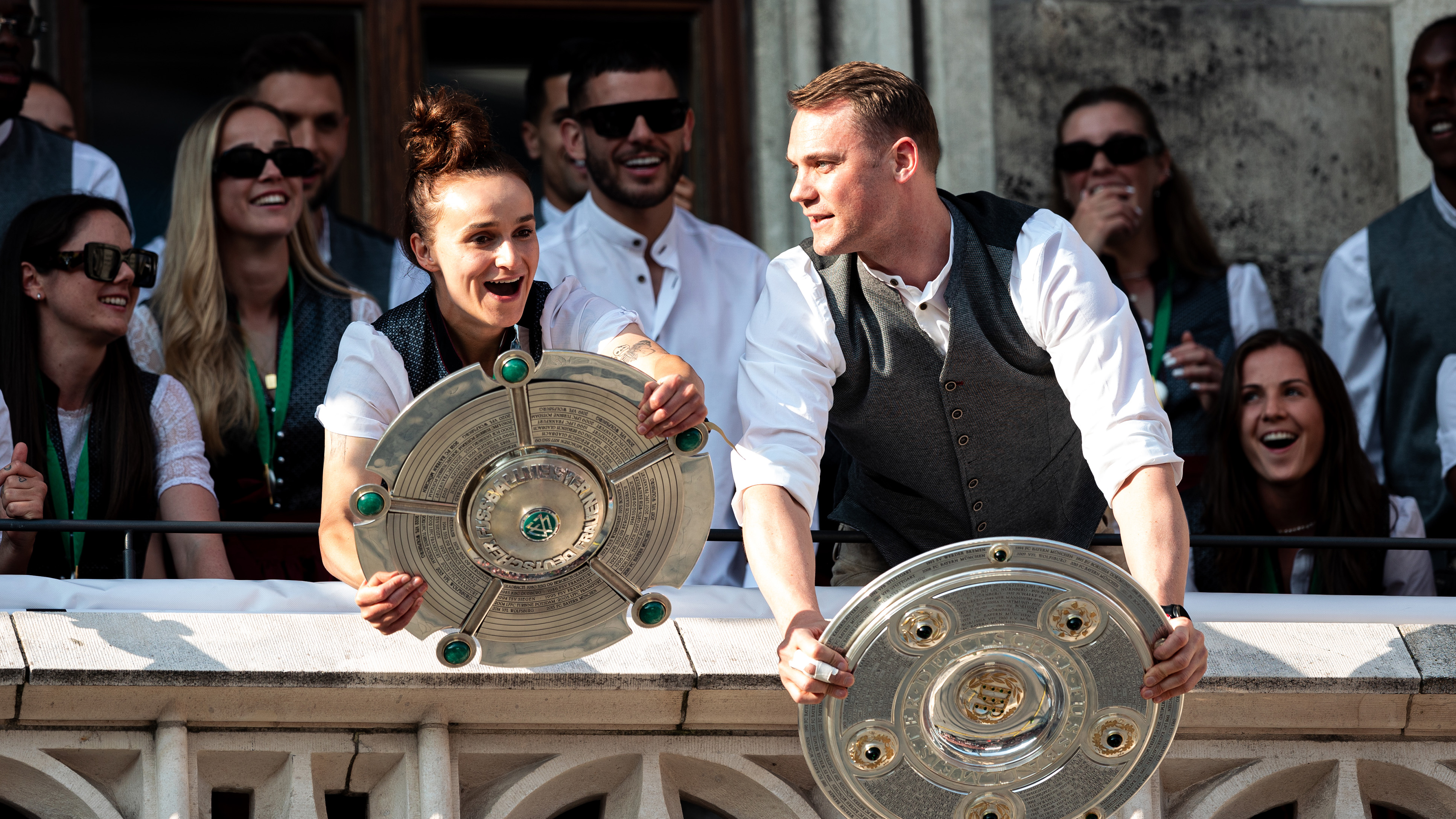 Lina Magull and Manuel Neuer at Bayern's title celebrations at Marienplatz.