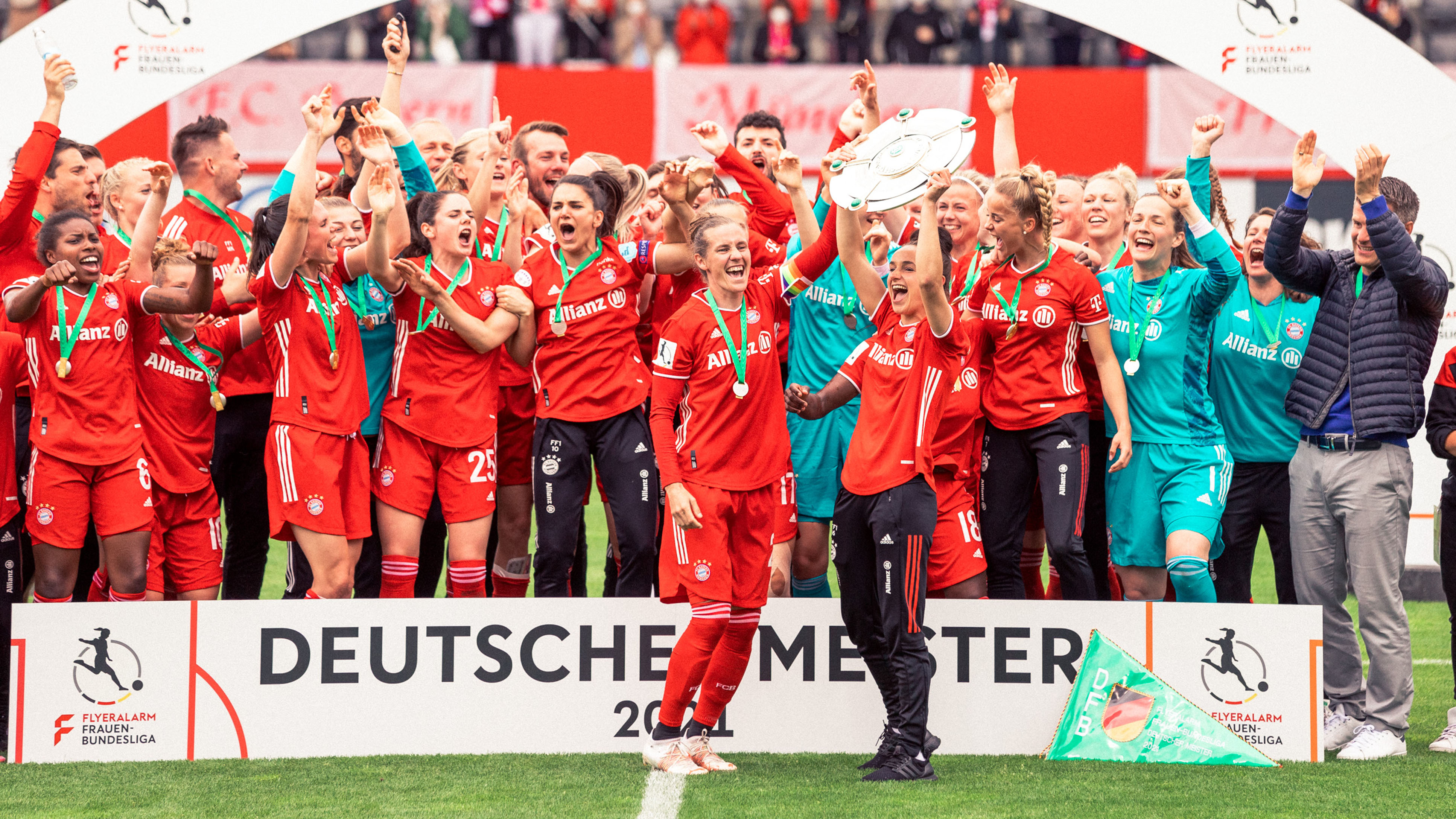 Lina Magull and Simone Laudehr at the 2021 Bundesliga title celebrations.