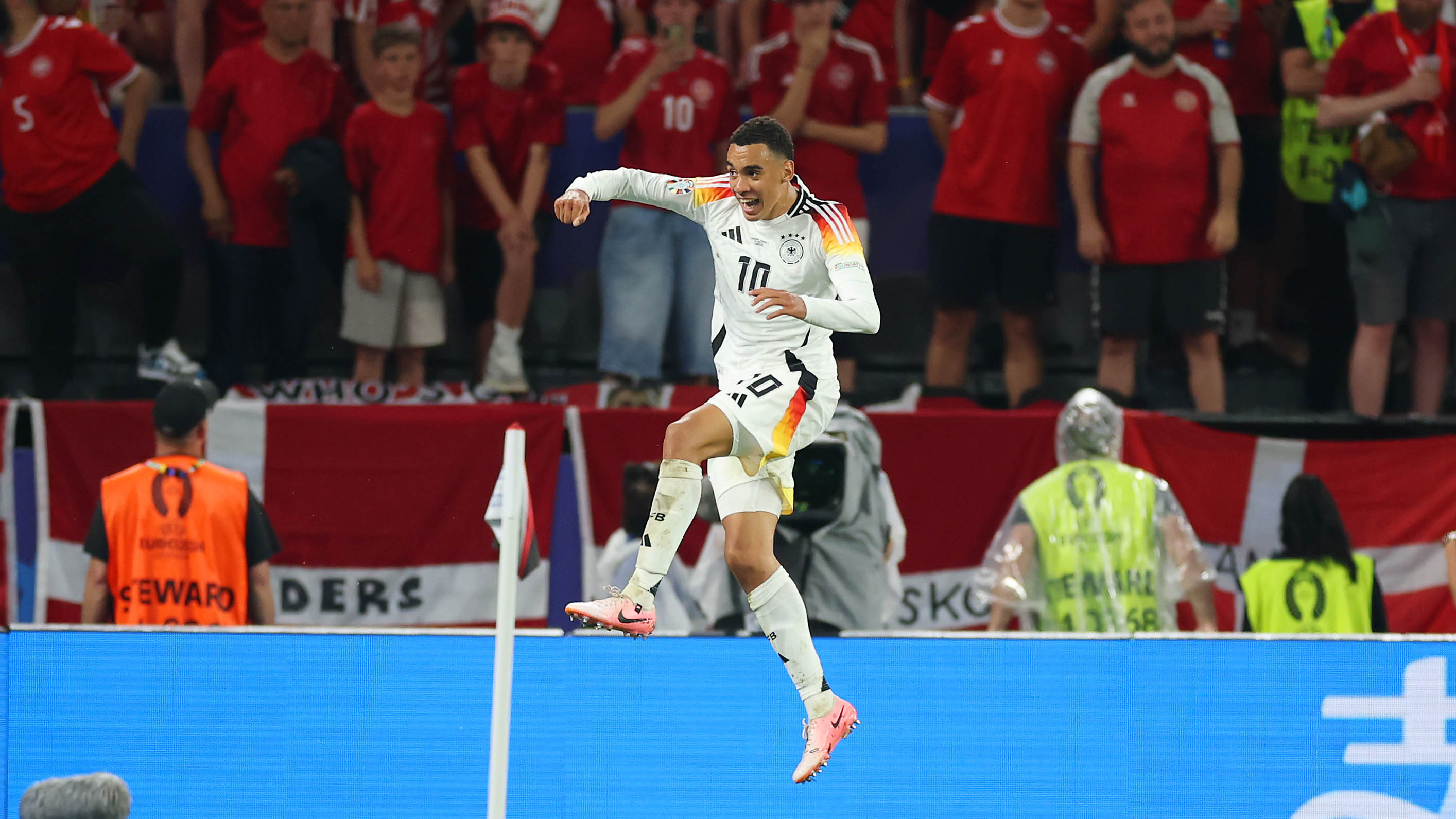 Jamal Musiala celebrates against Denmark