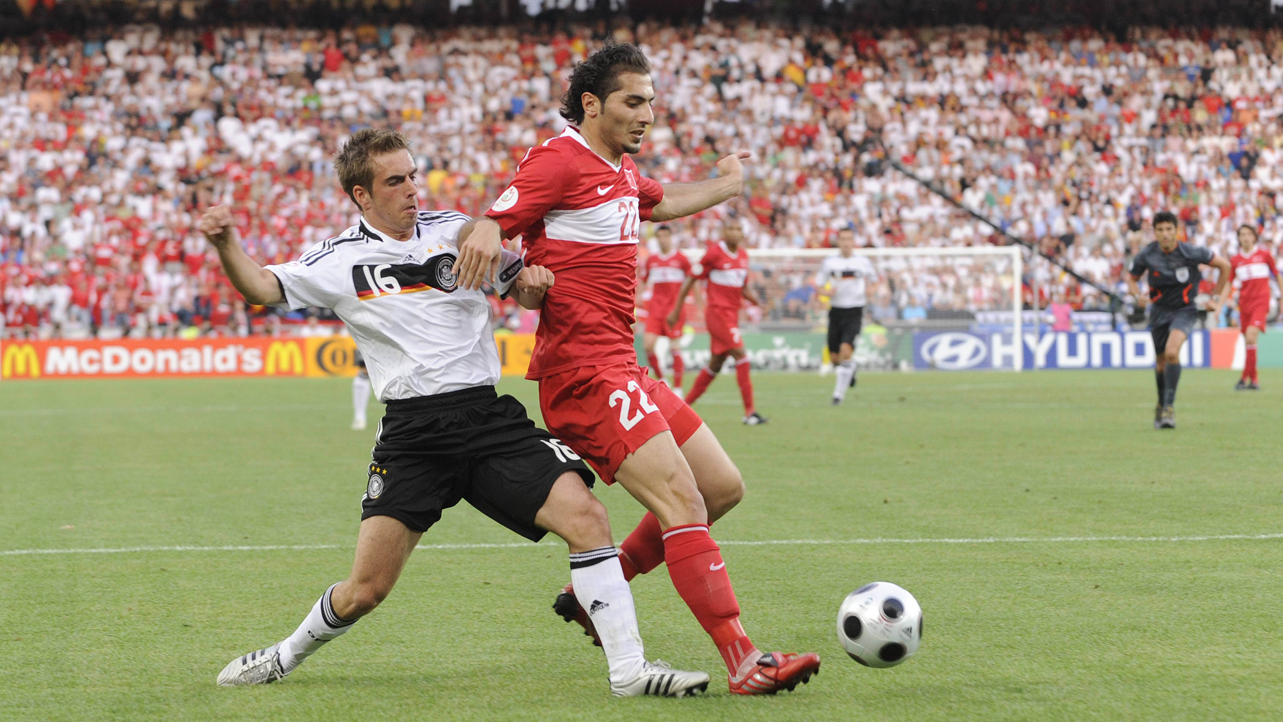 Philipp Lahm challenging Hamit Altintop at Euro 2008.