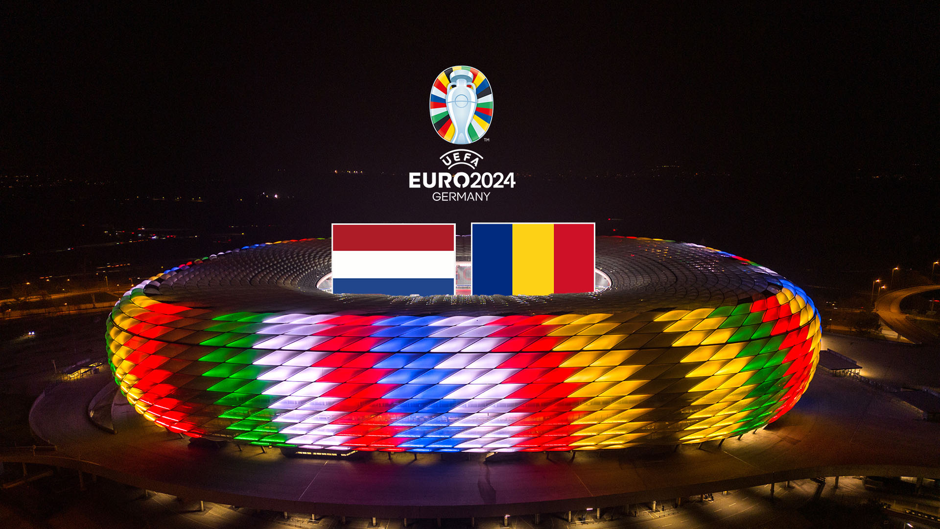 Rumänische und niederländische Flagge über der Allianz Arena in Sonderbeleuchtung zur UEFA EURO 2024