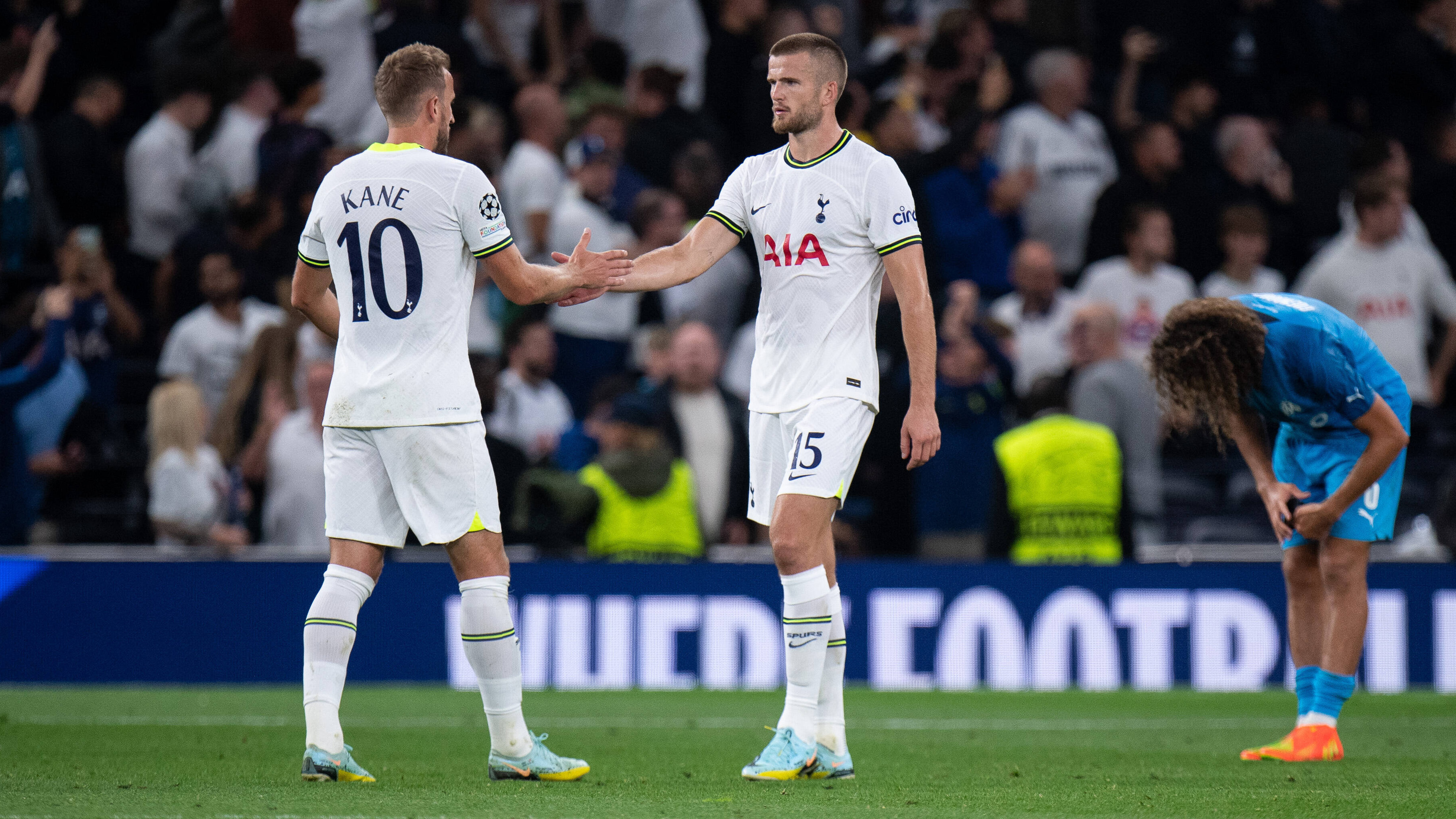 Harry Kane and Eric Dier shake hands during a match for Tottenham Hotspur