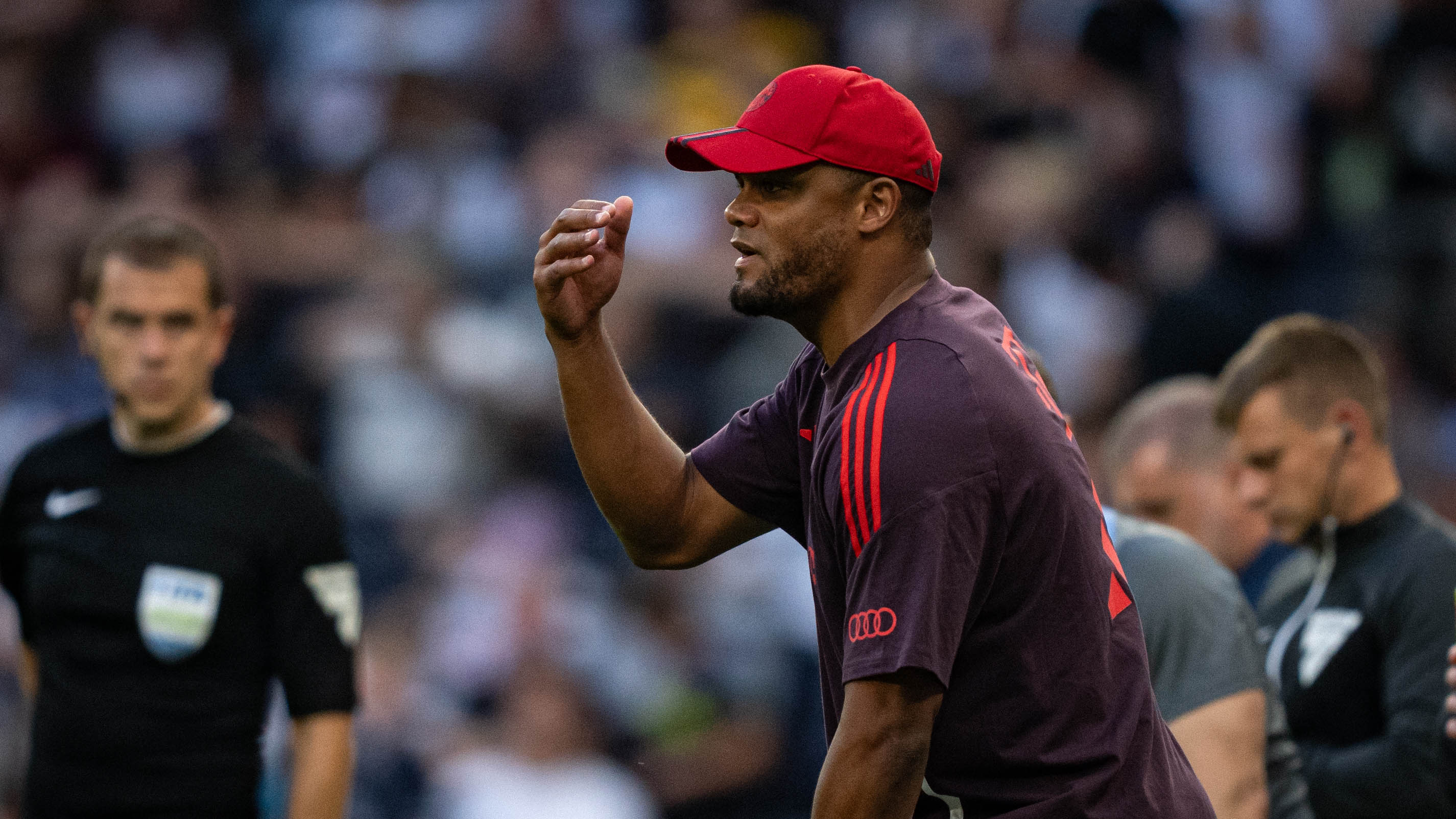 Vincent Kompany on the touchline.