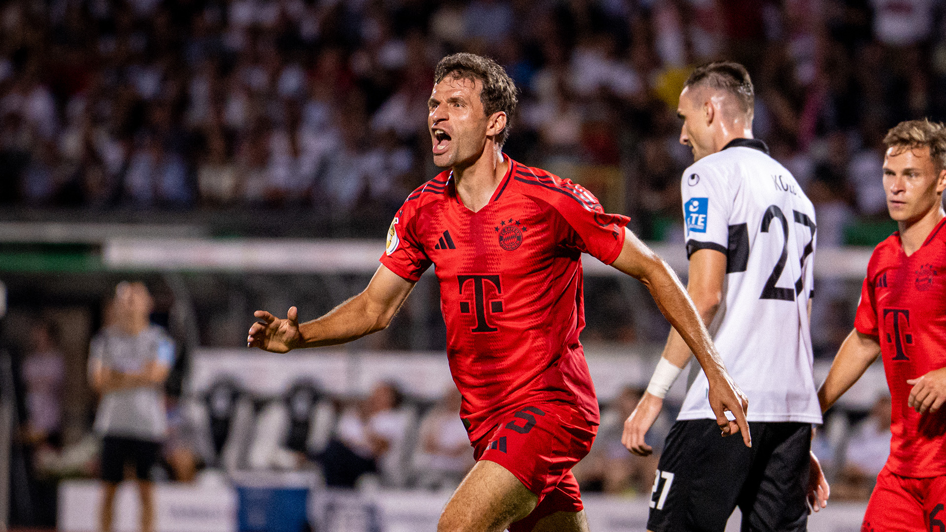 Thomas Müller celebrates a goal against Ulm.