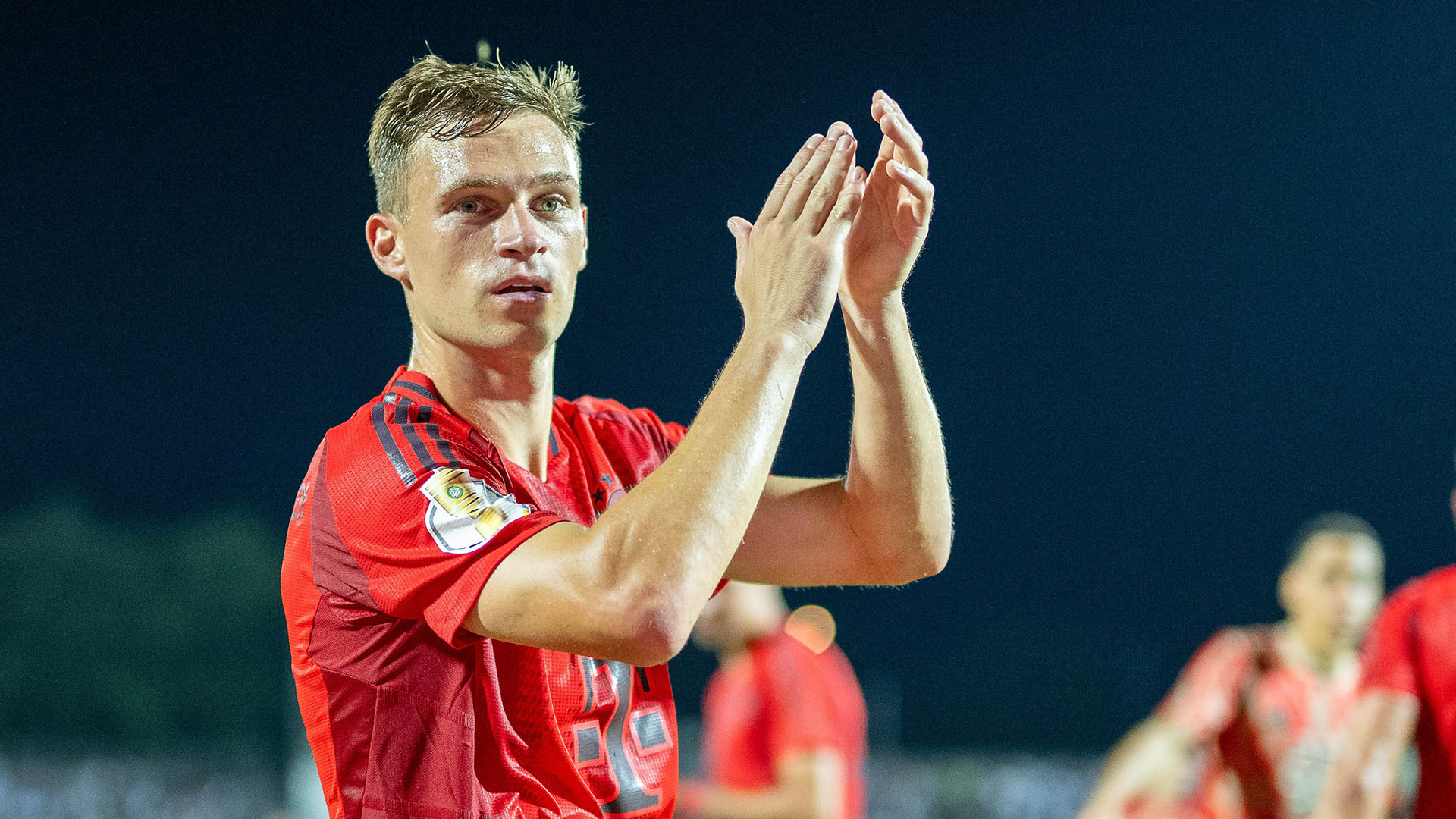 Joshua Kimmich celebrates after the game in Ulm