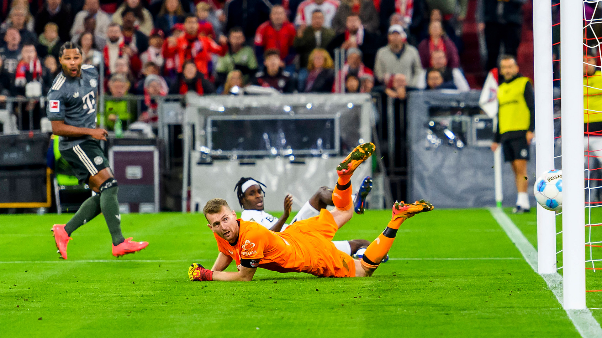 Serge Gnabry watches as his shot hits the post against Leverkusen