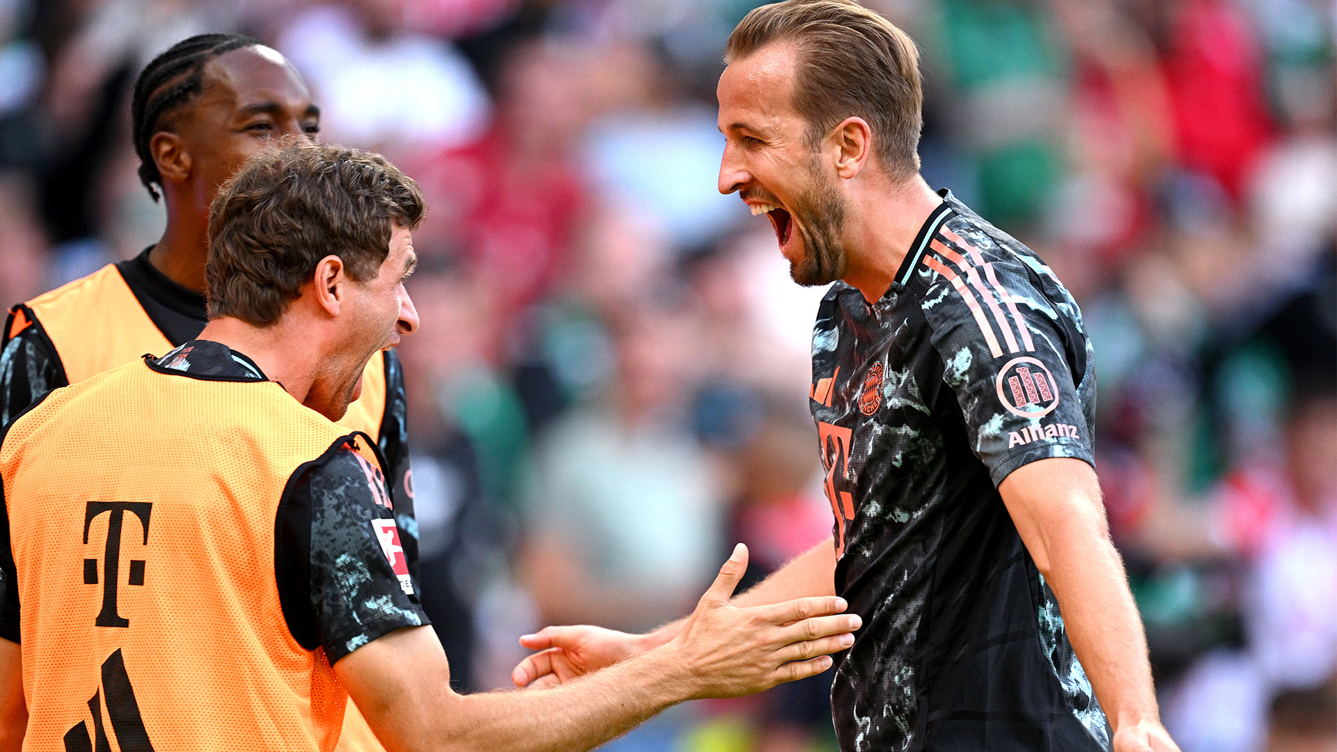 Harry Kane celebrates a goal against Werder Bremen