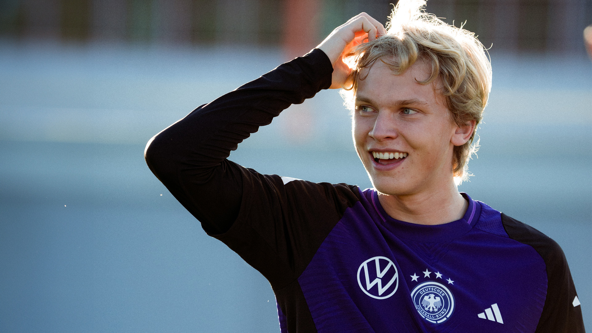 Frans Krätzig smiling during training for the Germany U21 team