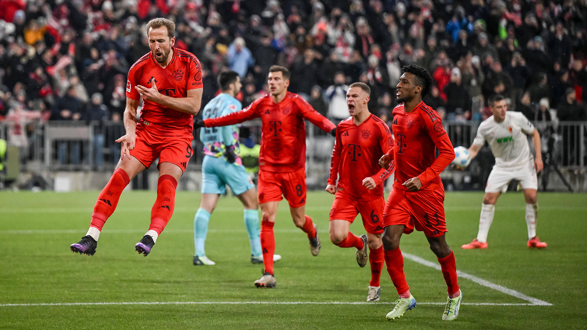 Harry Kane celebrates a goal against Augsburg