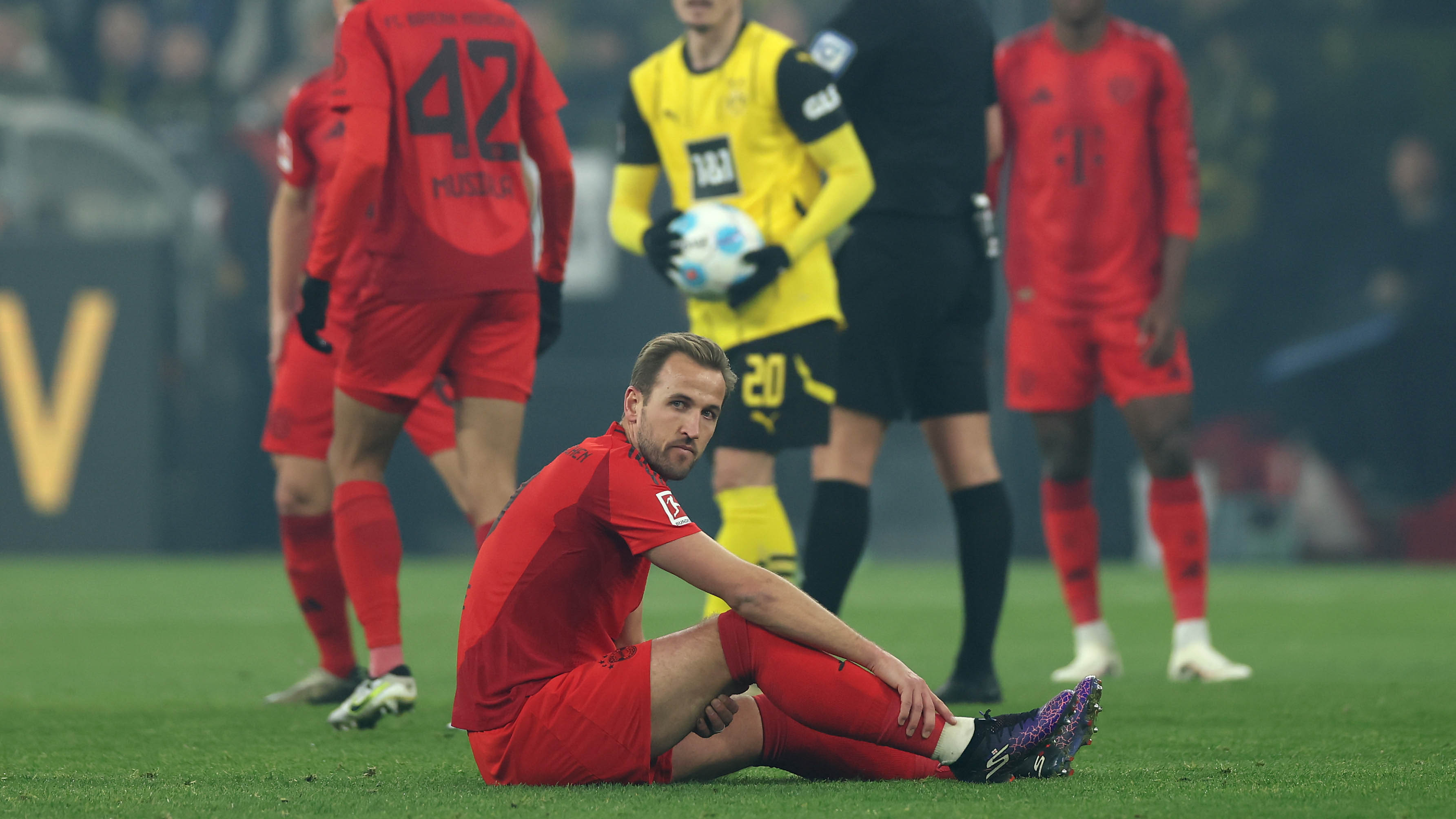 Harry Kane limped off in Dortmund